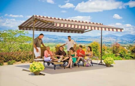 Group enjoying outdoor patio with scenic mountain view