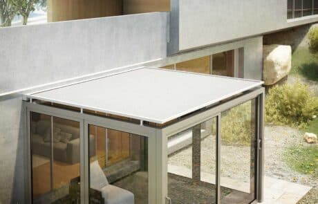 Modern glass patio with overhead canopy