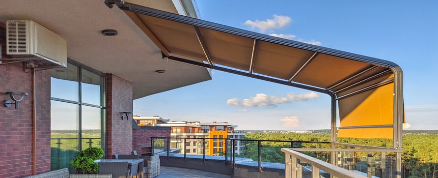 The Benefits of Pergola Awnings (2) (1) Best Awning Company highlights The Benefits of Pergola Awnings. A modern rooftop terrace with a retractable awning offers shade and style.